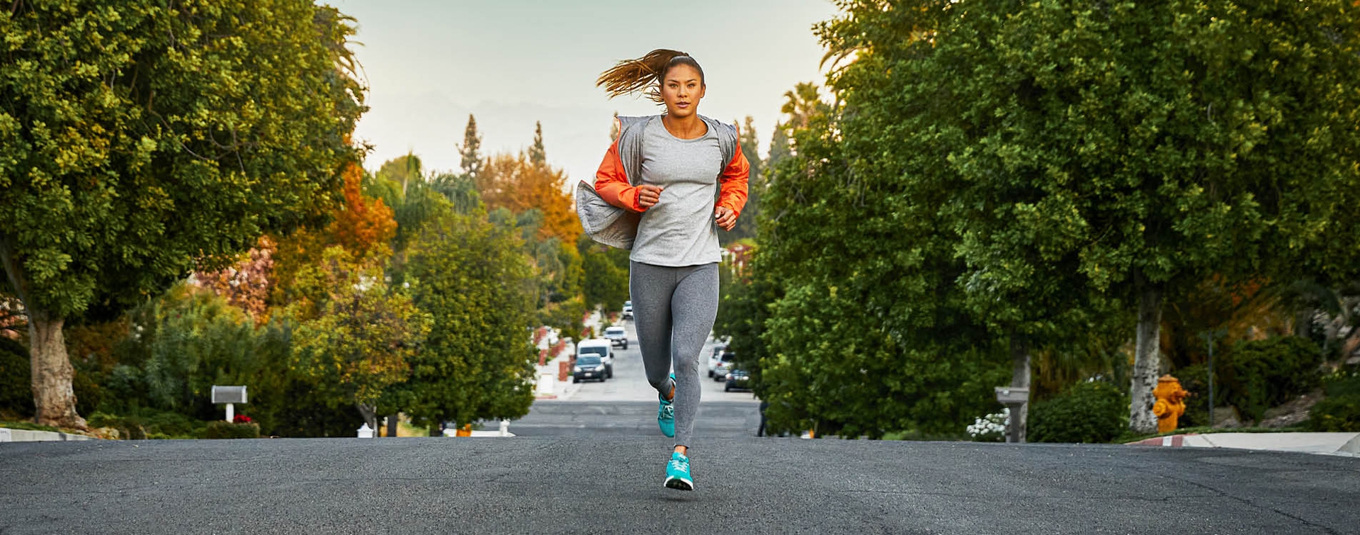 Girl running in a pair of Altra Shoes