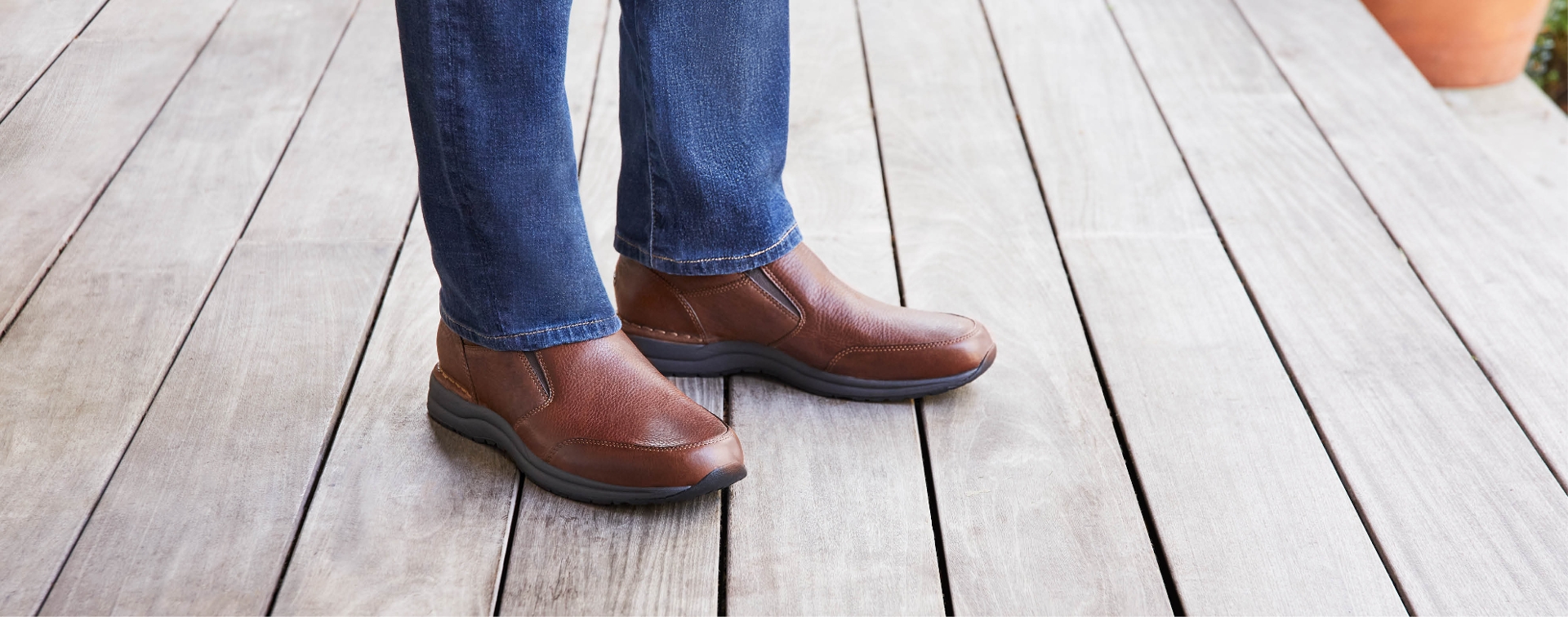 Close up shot of man wearing brown shoes
